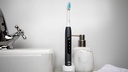 Oral-B Pulsonic Slim Luxe 4500 Periuță de dinți electrică sonică, 2 perii de schimb, 3 moduri de curățare pentru îngrijirea dentară și gingii sănătoase, husă de călătorie, proiectată de Braun, negru mat